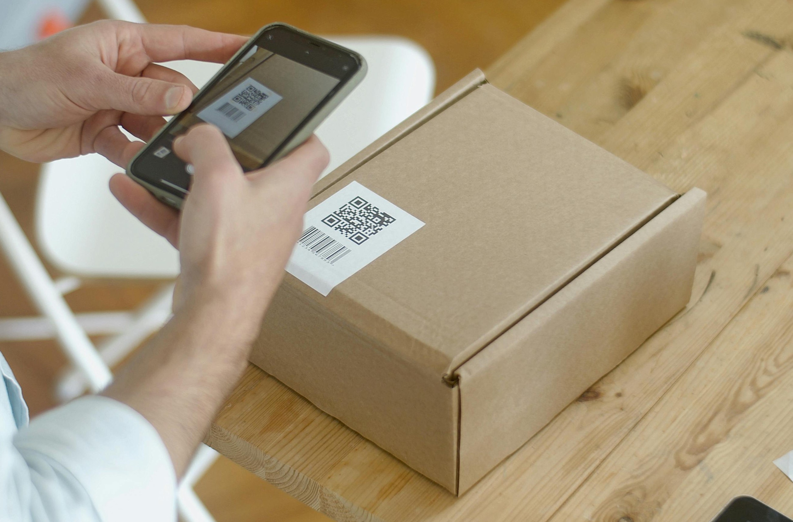 Man scanning packing ready to send