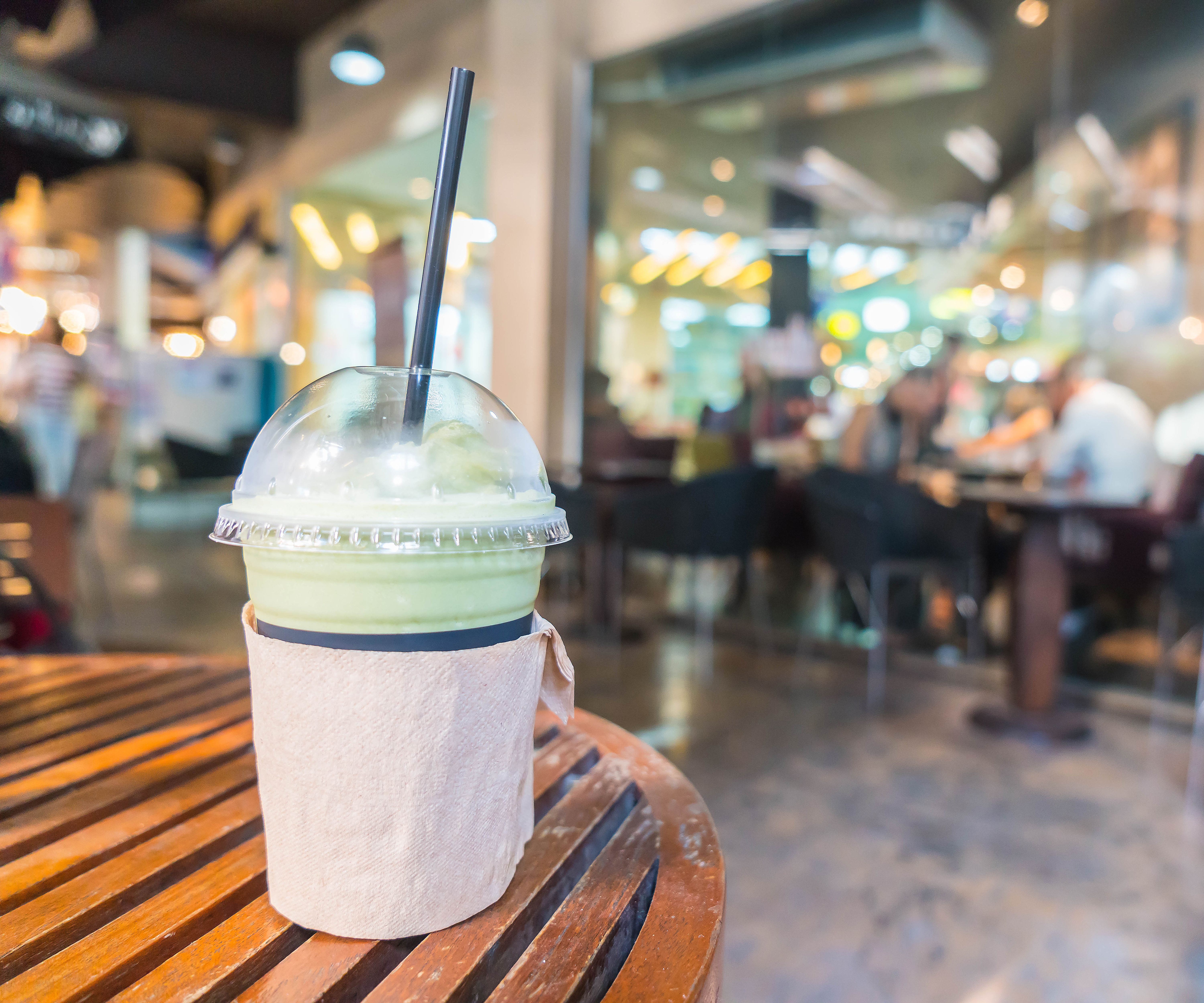 A Frappuccino in pub takeaway cup