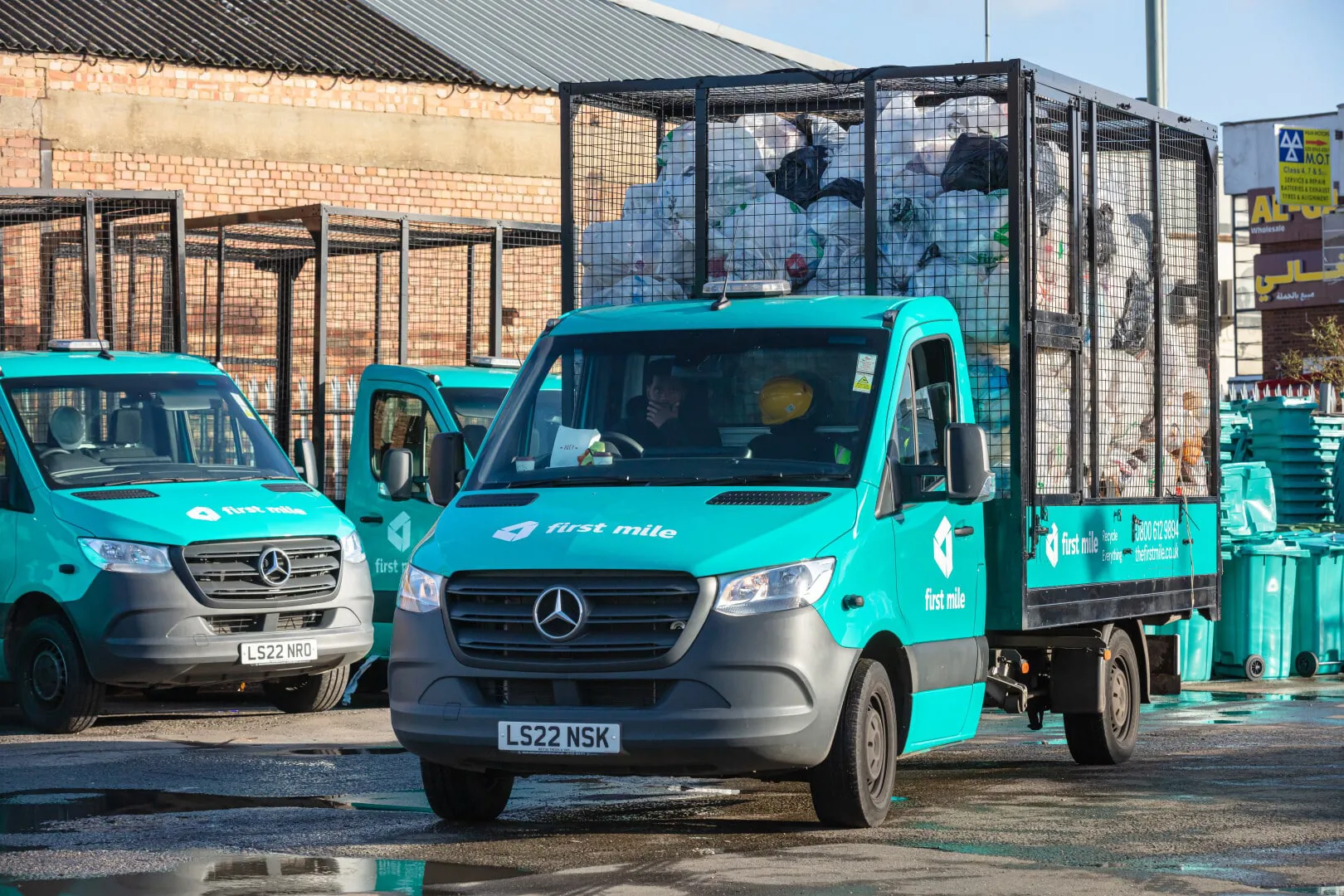 First Mile Cage Trucks