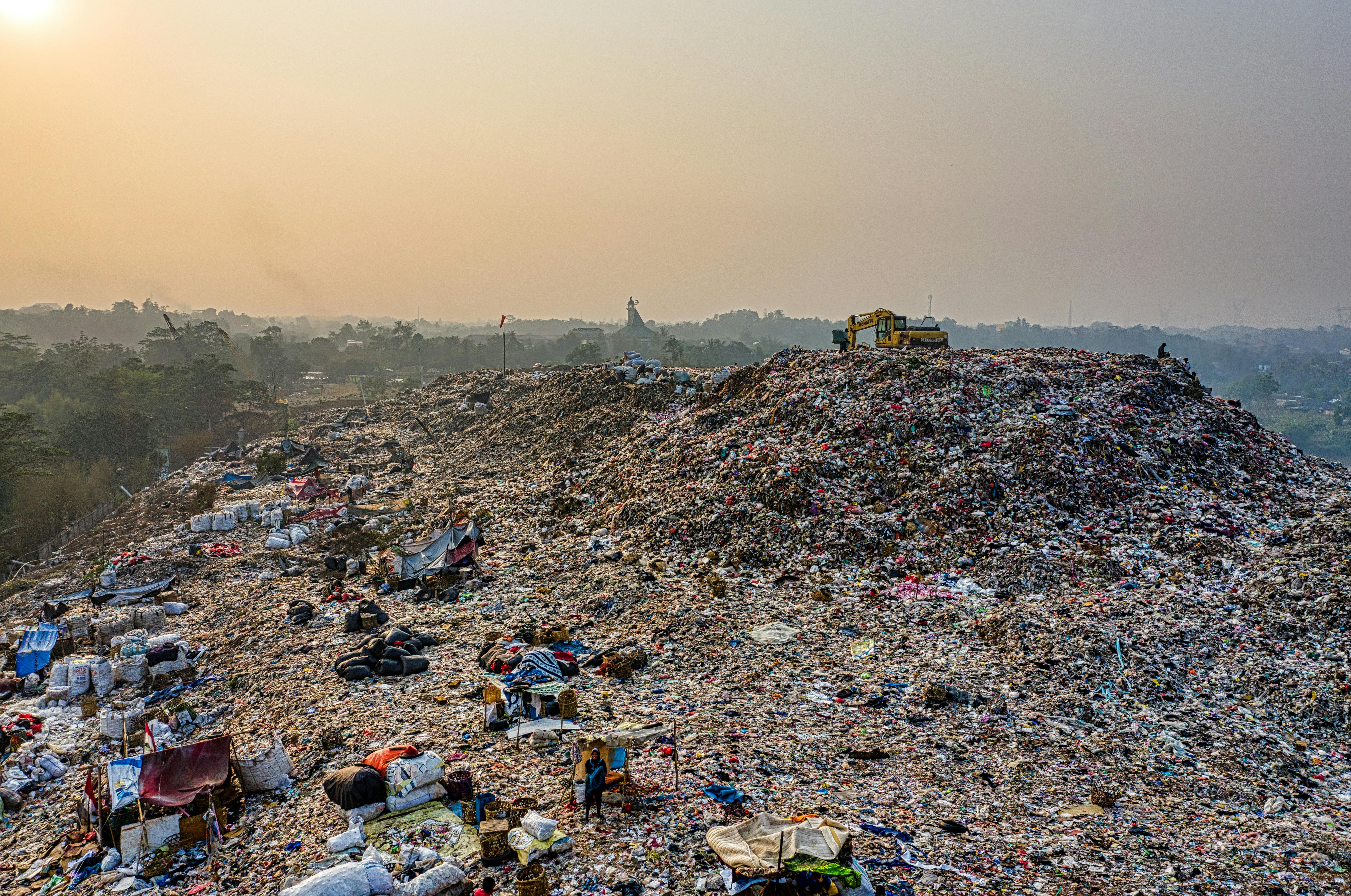 Landfill with a sunrise in the background